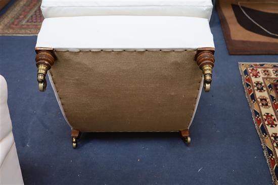 A pair of Victorian Howard & Sons club armchairs, W.2ft 6in. D.2ft 10in. H.2ft 5in.